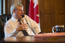 [Prime Minister Stephen Harper works in his Centre Block Office the day after the attacks in the nation's capital] 23 October 2014