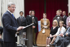 [Prime Minister Stephen Harper delivers remarks at the Confederation Centre of the Arts to mark the upcoming 150th anniversary of the Charlottetown Conference in Charlottetown, Prince Edward Island] 19 June 2014
