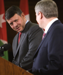 [King Abdullah of Jordan and Prime Minister Stephen Harper talk during a news conference following their meeting on Parliament Hill in Ottawa] 13 July 2007