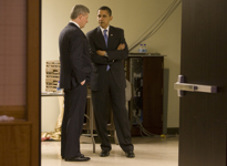 [Prime Minister Stephen Harper chats with in a hotel kitchen hallway with US President Barack Obama at the Summit of the Americas in Port of Spain, Trinidad and Tobago] 18 April 2009