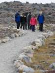 [Prime Minister Stephen Harper, his wife Laureen Harper and his daughter Rachel walk with local candidate Leona Aglukkaq and Nunavut Premier Paul Okalik in Iqaluit, Nunavut] 20 September 2008