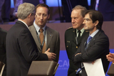 [Prime Minister Stephen Harper, Chief of Defence Staff General Walter Natynczyk and Peter MacKay, Minister of National Defence, chat prior to the start of the first plenary session at the NATO Summit in Chicago] 20 May 2012