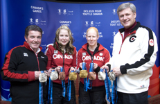 [Prime Minister Stephen Harper and Gary Lunn meet Paralympic medallists Viviane Forest and Lindsay Debou at the 2010 Paralympic Games in Whistler, British Columbia] 21 March 2010