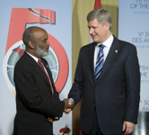 [Prime Minister Stephen Harper hosts a bilateral meeting with René Préval, the President of Haiti, at the Summit of the Americas in Port of Spain, Trinidad and Tobago] 18 April 2009