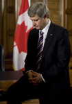 [Prime Minister Stephen Harper takes a moment before recording a video greeting in his Parliament Hill office] 11 February 2009