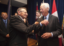 [Walter Gretzky jokingly punches Gordie Howe at the Air Canada Centre in Toronto, Ontario] 25 June 2012