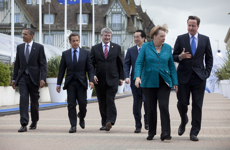 [US President Barack Obama, French President Nicolas Sarkozy, Prime Minister Stephen Harper and Japanese Prime Minister Naoto Kan follow German Chancellor Angela Merkel and British Prime Minister David Cameron to the opening session at the G8 Summit in Deauville, France] 26 May 2011