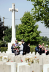 [Prime Minister Stephen Harper and his wife Laureen Harper visit a military cemetery in Bralin, France] 18 July 2006