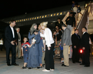 [Minister Peter MacKay and Prime Minister Stephen Harper greet Canadians evacuated from Lebanon at the bottom of the stairs after arriving in Ottawa] 21 July 2006