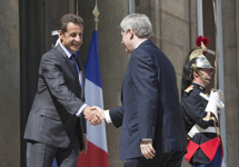 [French President Nicolas Sarkozy says goodbye to Prime Minister Stephen Harper following meetings at the Palais de l'Élysée in Paris, France] 4 June 2010