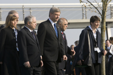 [Prime Minister Stephen Harper and other NATO leaders head to the leaders' bus following a family photo in Strasbourg, France] 4 April 2009