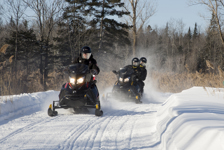 [Prime Minister Stephen Harper enjoys the outdoors during a snowmobile ride as part of his two-day winter tour in Québec City] 13 February 2015