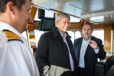 [Prime Minister Stephen Harper and Denis Lebel ride on the Arctic tugboat in Sept-Îles, Quebec] 14 October 2014