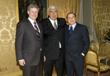 [Joe Comuzzi has a photo taken with Prime Minister Stephen Harper and Italian Prime Minister Silvio Berlusconi at the Palazzo Chigi, the Prime Minister's office in Rome] 28 May 2008