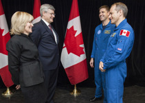 [Prime Minister Stephen Harper and his wife Laureen Harper chat with astronauts Jeremy Hansen and David Saint-Jacques at the Canada Aviation and Space Museum in Ottawa prior to a video conference with Commander Chris Hadfield] 15 March 2013