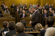[Prime Minister Stephen Harper makes a statement regarding the Opposition's plan to form a coalition government during Question Period on Parliament Hill] 1 December 2008