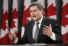 [Prime Minister-designate Stephen Harper talks to the media about Justice John Gomery's final report during a press conference at the National Press Theatre in Ottawa] 2 February 2006