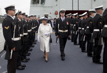 [Her Majesty Queen Elizabeth II inspects an honour guard after arriving on the HMCS St. John's for a fleet review of 28 Canadian and foreign warships at anchor in Bedford Basin and Halifax Harbor] 29 June 2010