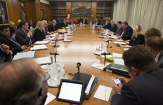 [Prime Minister Stephen Harper meets with his cabinet after delivering remarks in the House of Commons addressing the attacks in the nation's capital] 23 October 2014
