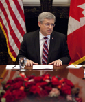 [Prime Minister Stephen Harper discusses the global economy with business leaders at the New York Stock Exchange in New York City, New York] 21 September 2011
