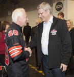 [Prime Minister Stephen Harper chats with Governor General David Johnston prior to the start of the Grey Cup in Toronto] 25 November 2012