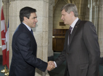 [Prime Minister Stephen Harper greets French Prime Minister François Fillon in the Rotunda on Parliament Hill in Ottawa] 2 July 2008