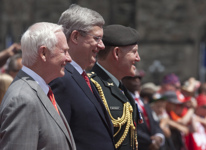 [Governor General David Johnston, Prime Minister Stephen Harper, and Chief of Defence Staff General Walter Natynczyk attend Canada Day celebrations on Parliament Hill] 1 July 2012