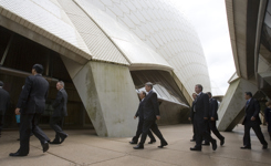 [Prime Minister Stephen Harper, middle, walks to the next meeting with other leaders and staff during the APEC Summit in Sydney, Australia] 7 September 2007