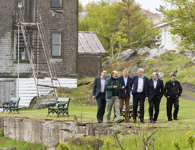 [Prime Minister Stephen Harper, joined by Denis Lebel, Maxime Bernier, Jacques Gourde and Blake Richards chat in the holding room at the Irish Memorial National Historic Site in Grosse Île, Quebec] 22 May 2015