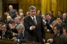[Prime Minister Stephen Harper fights the newly formed coalition during Question Period on Parliament Hill] 2 December 2008
