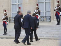 [Prime Minister Stephen Harper and British Prime Minister David Cameron, follow French President, Nicolas Sarkozy, into the Palais de l'Elysée for a meeting on Libya with other world leaders in Paris, France] 1 September 2011