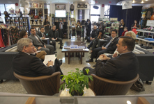 [Prime Minister Stephen Harper participates in an economic roundtable with James Moore and local business people at Hunni's Urban Boutique in Langley, British Columbia] 8 February 2013