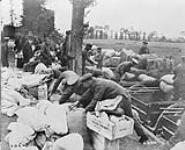 Loading up rations (1st Divisional Train - Cdn.Army Service Corps). July, 1916 July, 1916