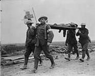 Bringing in wounded under the Red Cross Flag. September, 1916 Sept., 1916.