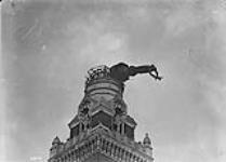 The Tower of Albert Cathedral showing the falling Statue, the result of German shell fire. October, 1916 Oct., 1916.