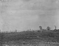 The enemy shell the ruins of Courcelette [France]. October, 1916.