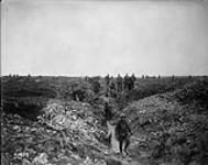 Canadians on guard over German dug-outs waiting for Huns to surrender. Vimy Ridge. April, 1917 April, 1917.