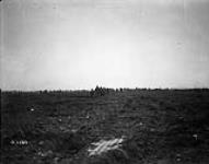 Canadians advancing over the crest of Vimy Ridge. April, 1917 Apr., 1917