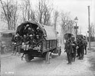 Scotties going in motor lorries to strafe the Hun April, 1917.