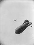 Two Kite-Balloon in mid-air behind the Canadians. April, 1917 April, 1917.