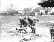 Prince Arthur of Connaught working a German Trench Mortar captured at Vimy Ridge by the Canadians. May, 1917 May, 1917.