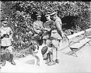 Lt.-Gen. Sir Julian Byng, G.O.C. Canadians, talking with two of his Brigadiers May, 1917.