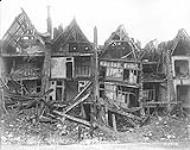 Some of the ruined houses in Arras. May, 1917 May, 1917.