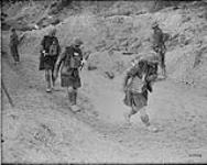 Wounded Canadian Kiltie coming in during the attack on Hill 70 [near Lens] August, 1917 August, 1917.