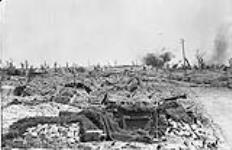 Shells bursting in village behind the Canadian lines. September, 1917 September, 1917.