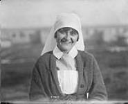 Canadian Sister wearing her winter jumper - Merry and Bright - Somewhere in France. December, 1917 Dec., 1917.