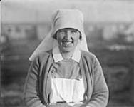 Canadian Sister wearing her winter jumper - Merry and Bright - Somewhere in France. December, 1917 Dec. 1917.