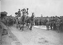 A wagon load of Canadian beauties who took part in the circus. Canadian Circus behind the Lines. Dominion Day, 1918. The 3rd Division concert party-the 'Dumbells' arriving at the Corps gathering at Tincques July, 1918.