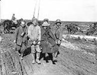 German prisoners bringing in a Canadian wounded. Advance East of Arras. October, 1918 Oct. 1918.