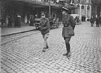 The Prince of Wales takes a walk in Mons. Nov., 1918